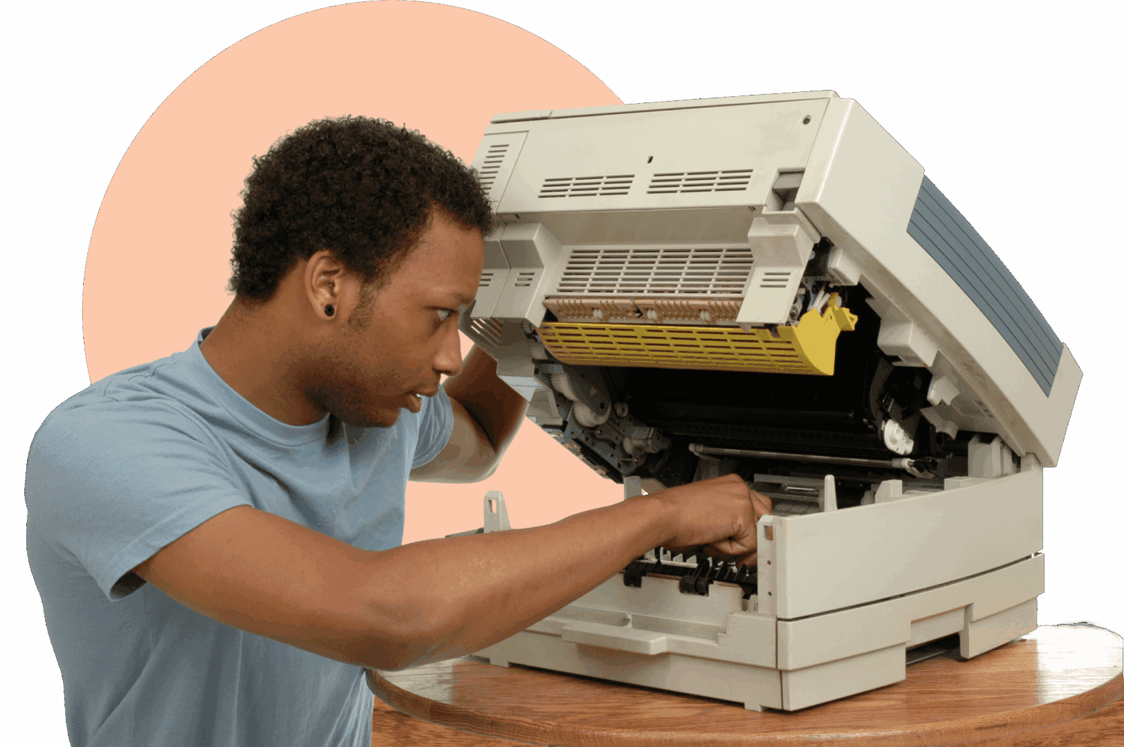 Group 1321316415 Man repairing a large printer machine.